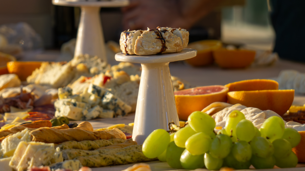 Everything you need to know about grazing tables in 2026: what goes on them, ideas by event type, how much they cost, and when to hire a caterer vs DIY.